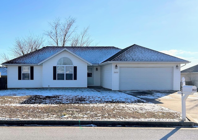 single story home with a garage