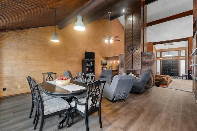 dining space with wooden ceiling, beamed ceiling, ceiling fan, dark hardwood / wood-style floors, and high vaulted ceiling