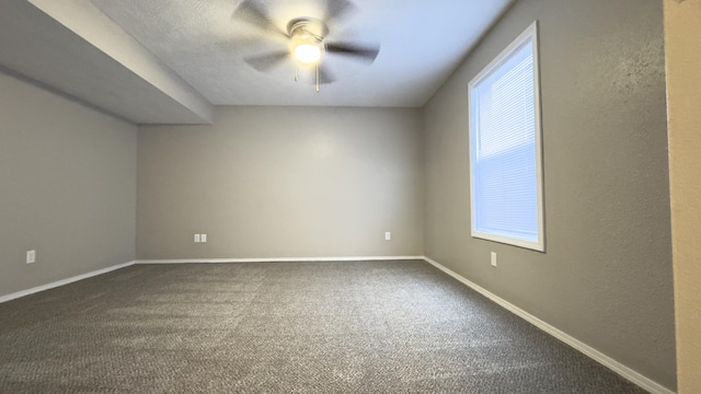 additional living space featuring carpet floors and ceiling fan