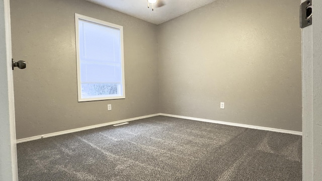 unfurnished room with carpet floors and ceiling fan