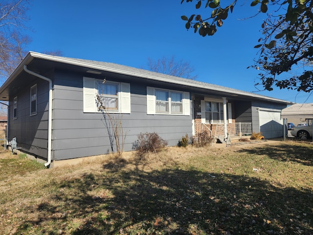 single story home with a porch and a front yard