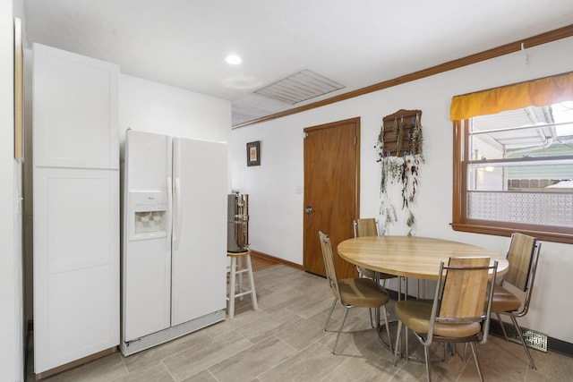 dining room with ornamental molding