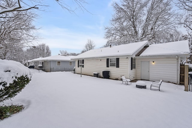 view of snow covered house