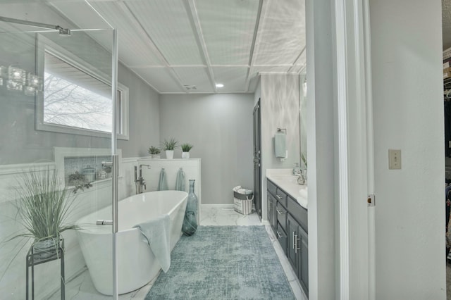 bathroom featuring a bathtub and vanity