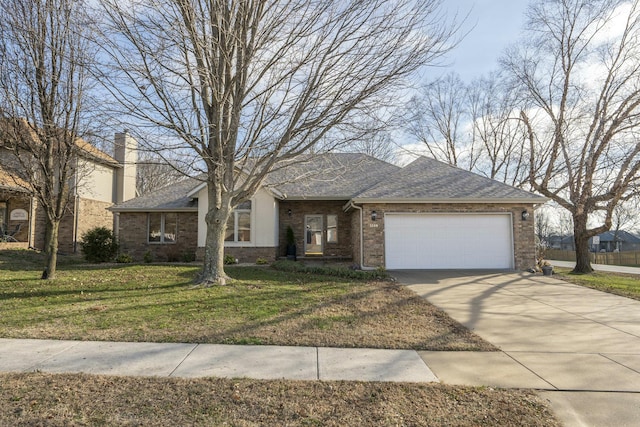 view of front of home with a garage and a front lawn