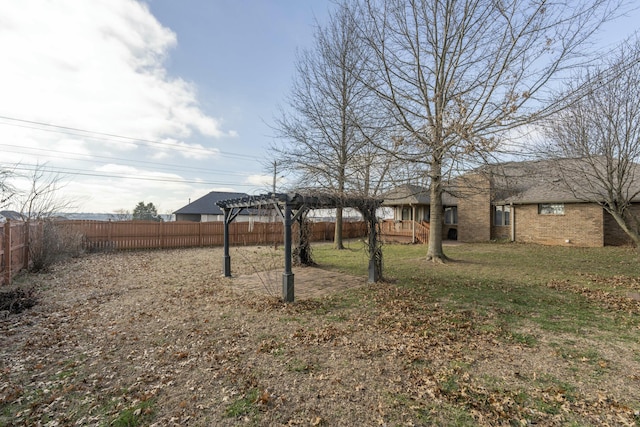 view of yard with a pergola