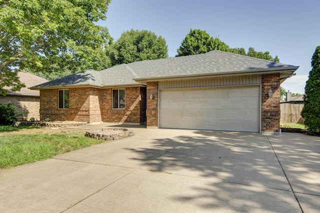 ranch-style house featuring a garage