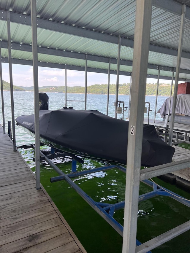 view of dock with a water view