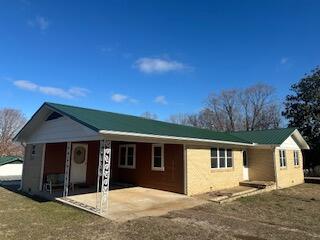 single story home with a patio area