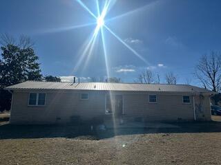 back of house with a patio area