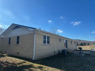 view of property exterior featuring cooling unit