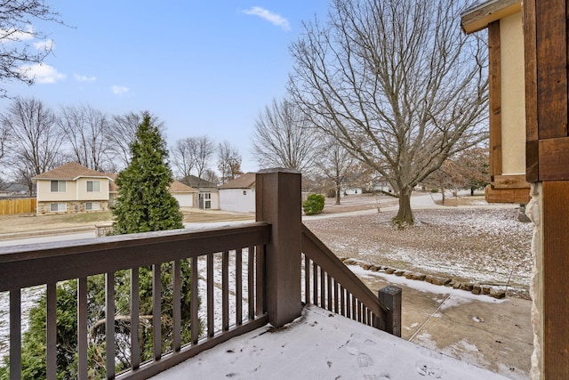 view of snow covered deck