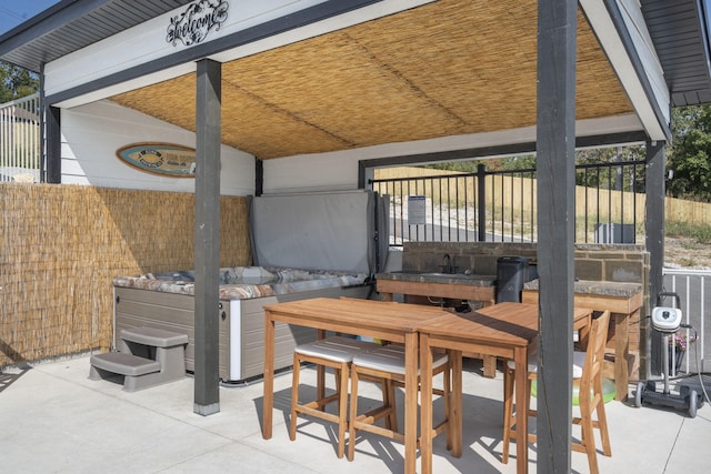 view of patio / terrace featuring exterior bar