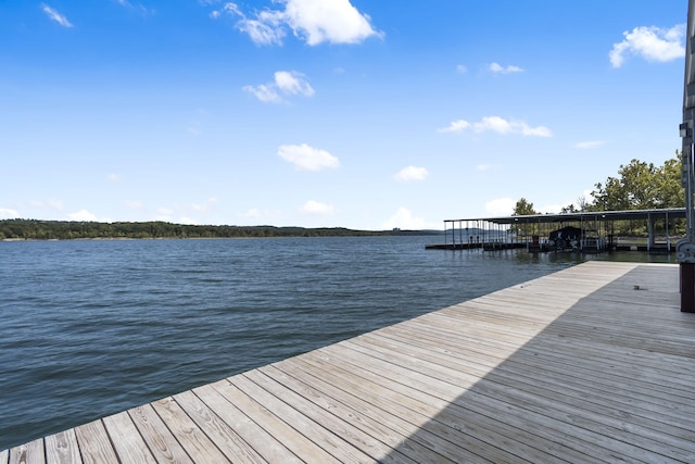 dock area featuring a water view