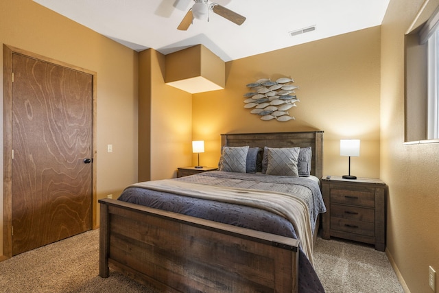 carpeted bedroom with ceiling fan