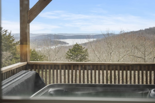 wooden terrace with a water view