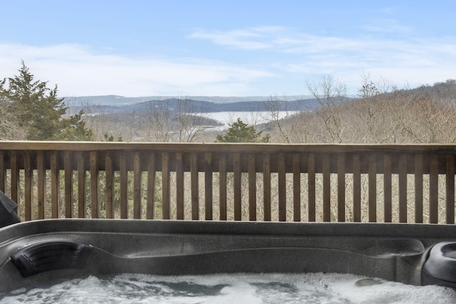 exterior space featuring a water and mountain view