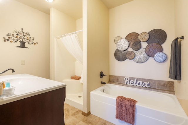 bathroom with vanity and independent shower and bath