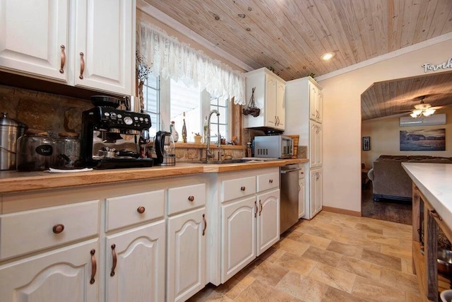 kitchen featuring white cabinetry, sink, stainless steel appliances, crown molding, and wooden ceiling