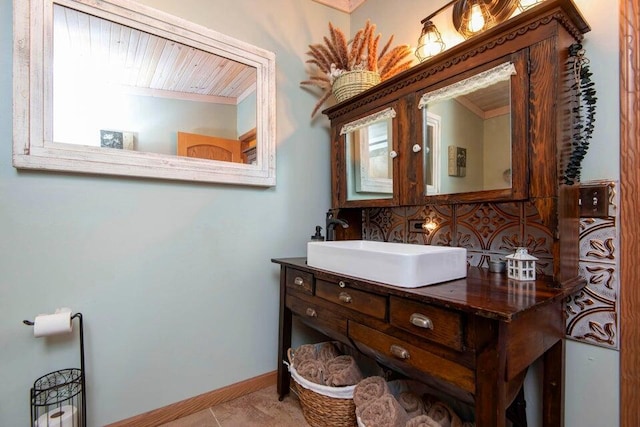 bathroom with vanity and backsplash