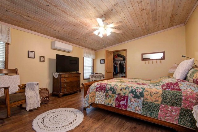 bedroom with hardwood / wood-style flooring, ornamental molding, an AC wall unit, and wooden ceiling