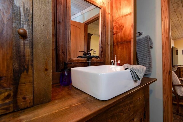 bathroom featuring sink and hardwood / wood-style flooring