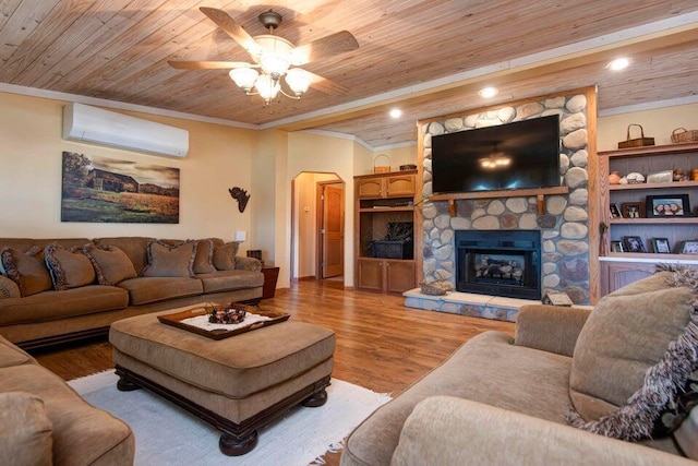 living room with wood ceiling, a wall mounted AC, and light wood-type flooring