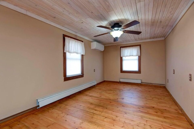 spare room with ornamental molding, a wall mounted AC, light wood-type flooring, and a baseboard heating unit