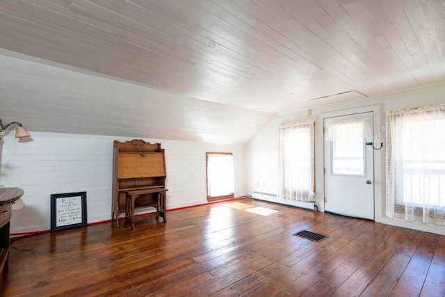 bonus room featuring a baseboard heating unit, vaulted ceiling, wooden ceiling, and dark hardwood / wood-style floors