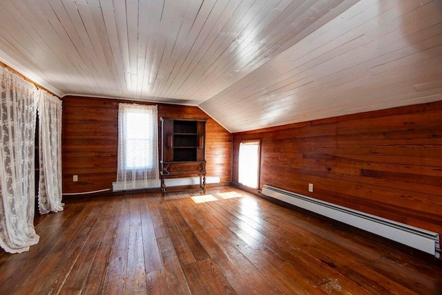 bonus room with dark hardwood / wood-style floors, wood walls, lofted ceiling, wood ceiling, and baseboard heating