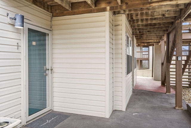 entrance to property featuring a patio area