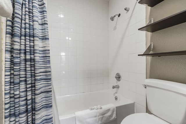 bathroom with toilet and shower / bath combo with shower curtain