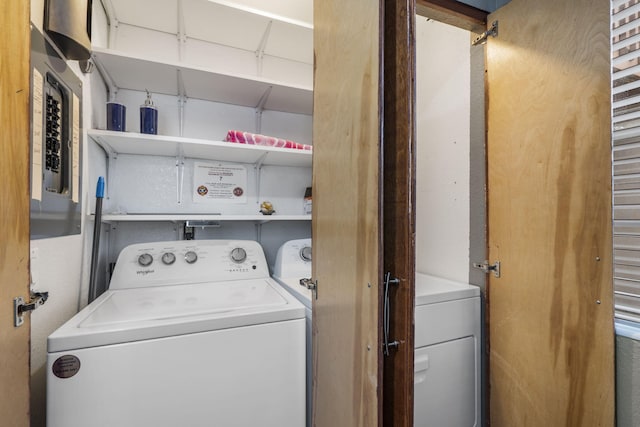 laundry area with washing machine and dryer