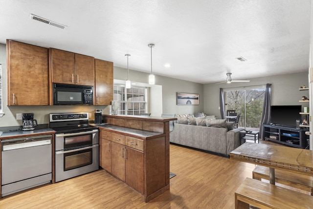 kitchen featuring stainless steel electric stove, ceiling fan, light wood-type flooring, dishwashing machine, and kitchen peninsula