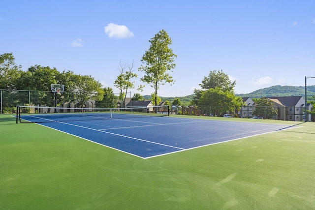 view of sport court featuring basketball court