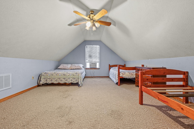 bedroom with carpet, vaulted ceiling, ceiling fan, and cooling unit