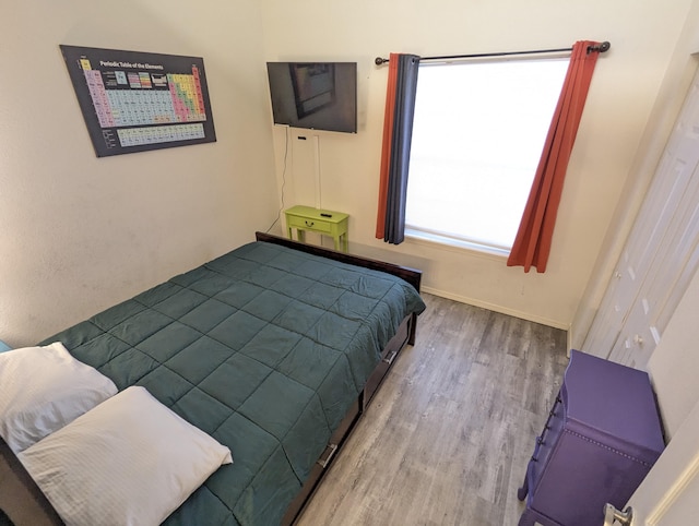 bedroom featuring hardwood / wood-style floors