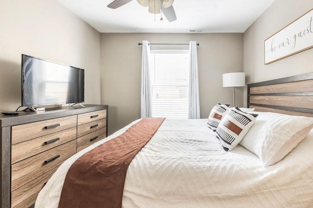 bedroom featuring ceiling fan