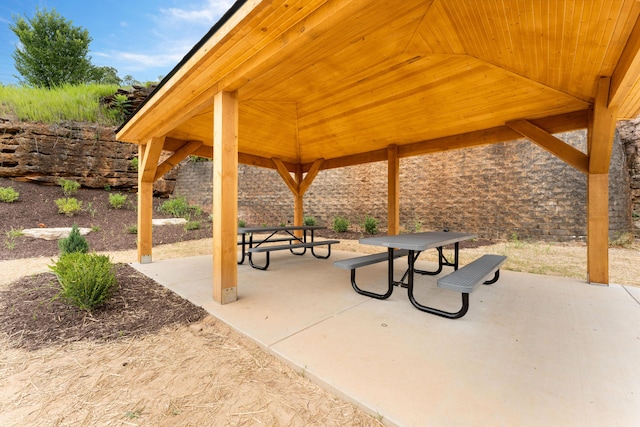 view of community featuring a gazebo and a patio