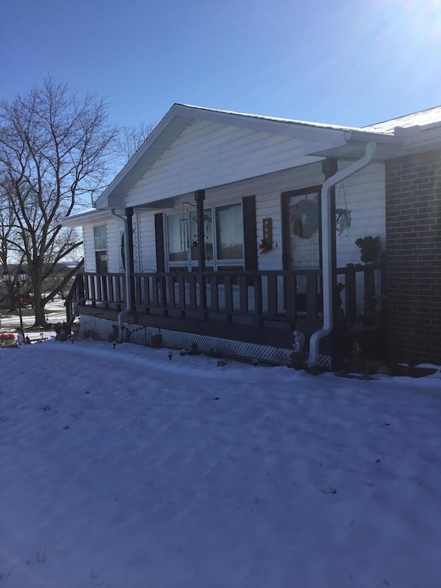 view of front of property featuring covered porch