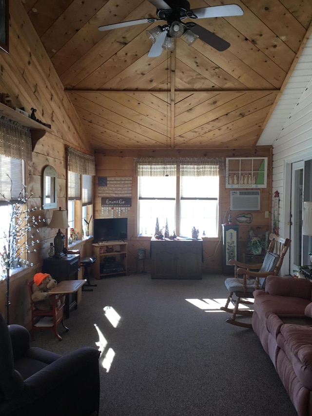 living room featuring carpet flooring, lofted ceiling, ceiling fan, and wooden walls