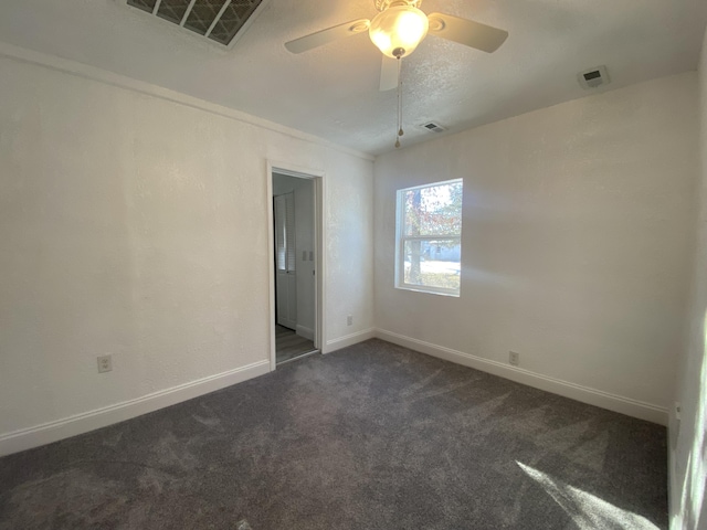 carpeted empty room with ceiling fan