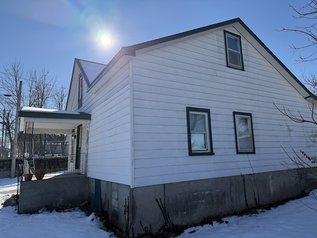 view of snow covered property