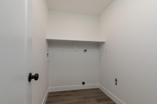 laundry area featuring dark wood-style floors, hookup for a washing machine, hookup for an electric dryer, laundry area, and baseboards