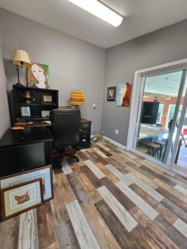 office space with hardwood / wood-style flooring