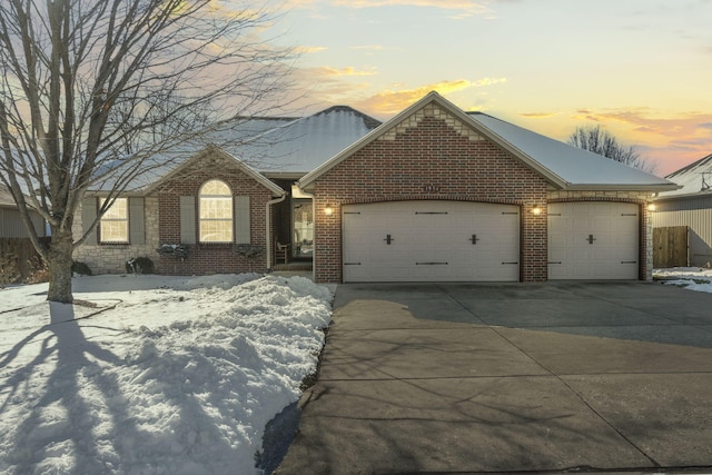 view of front of home with a garage