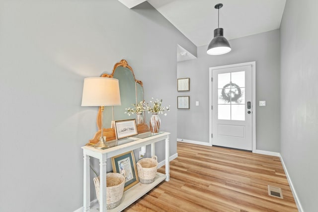 entrance foyer with hardwood / wood-style flooring