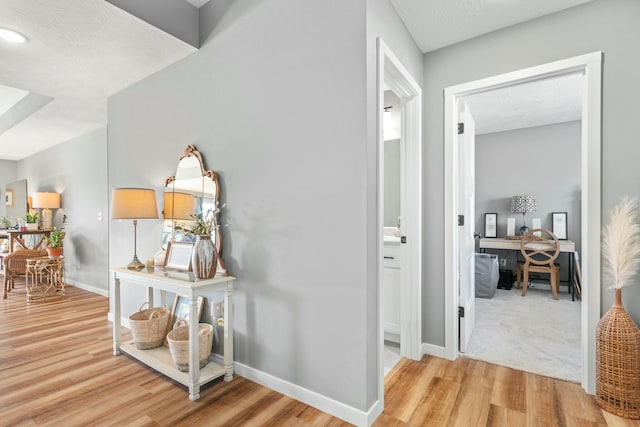 hall featuring wood-type flooring