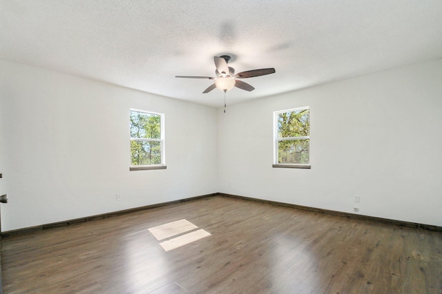 unfurnished room featuring dark hardwood / wood-style floors