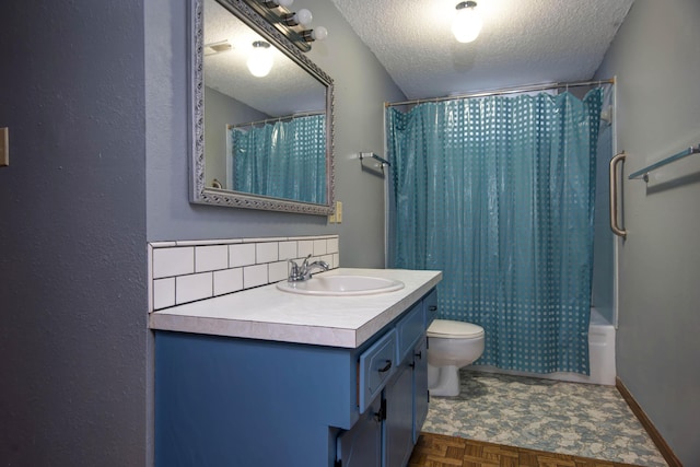 full bathroom with parquet floors, vanity, a textured ceiling, shower / bath combo with shower curtain, and toilet